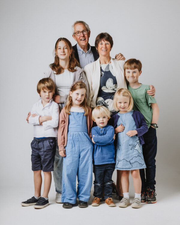 Photo of a family with grandparents and grandchildren in a photo studio
